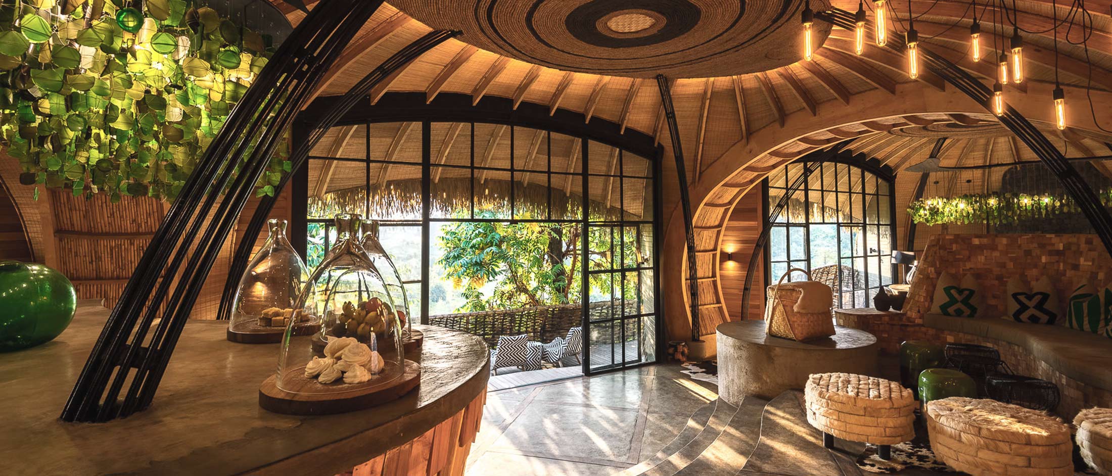 Sweeping volcano panorama over Rwanda’s Virunga peaks from Bisate Lodge