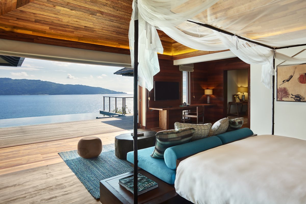 Panorama Pool Villa bedroom open to the ocean at Six Senses Zil Pasyon