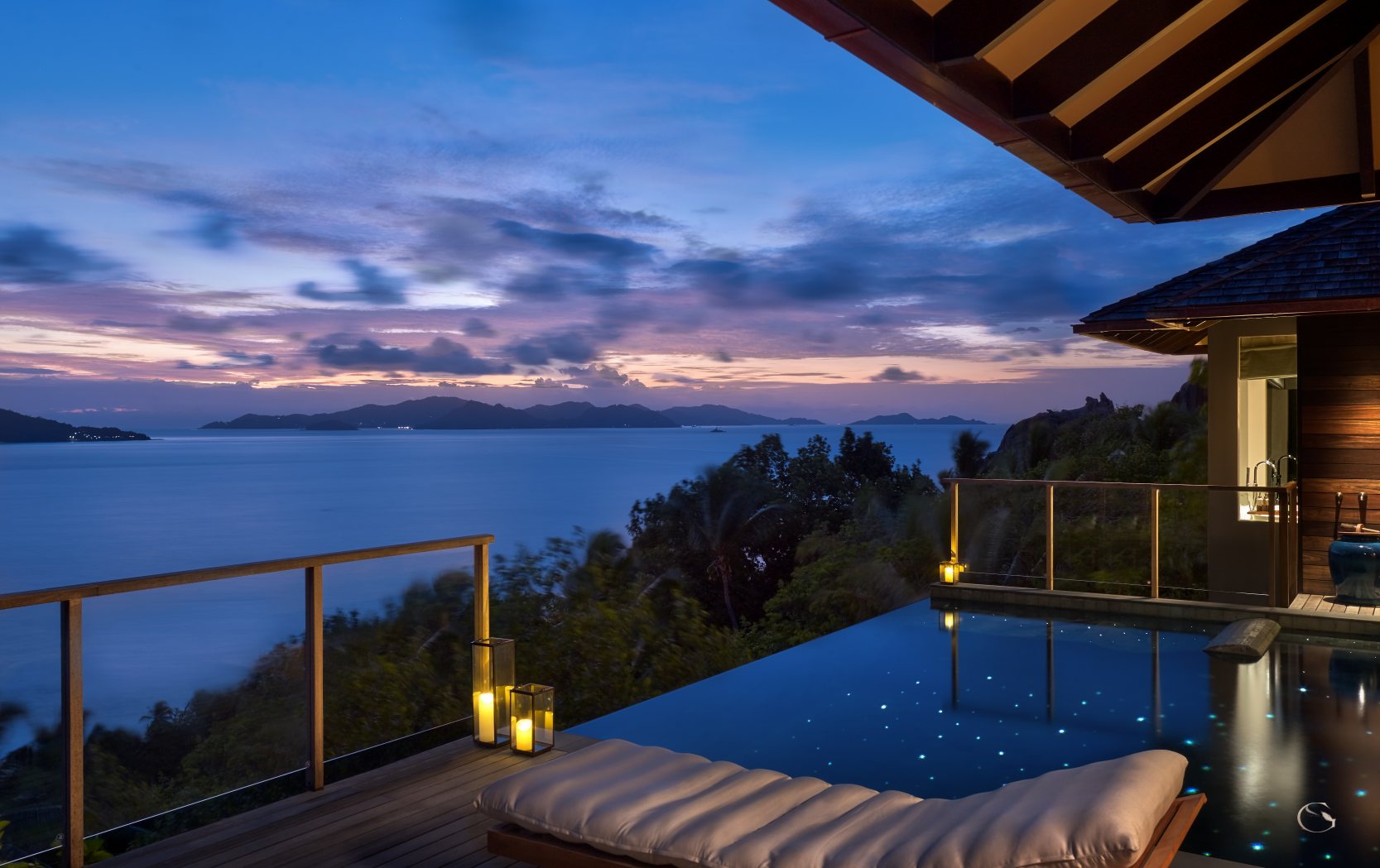 Signature Pool Villa deck at sunset, Six Senses Zil Pasyon LuxurySafariLodges.com