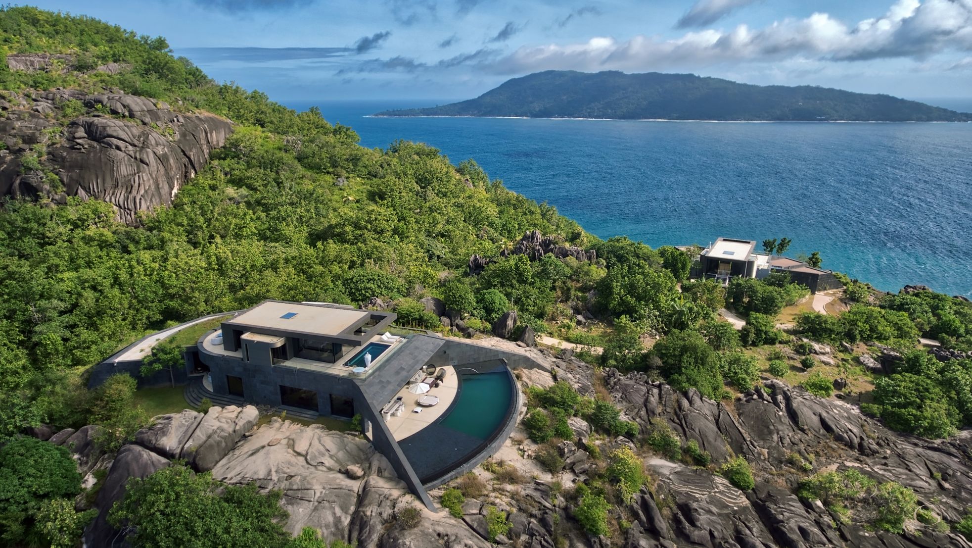 Ocean Sounds Residence on the hilltop of Félicité Island LuxurySafariLodges.com