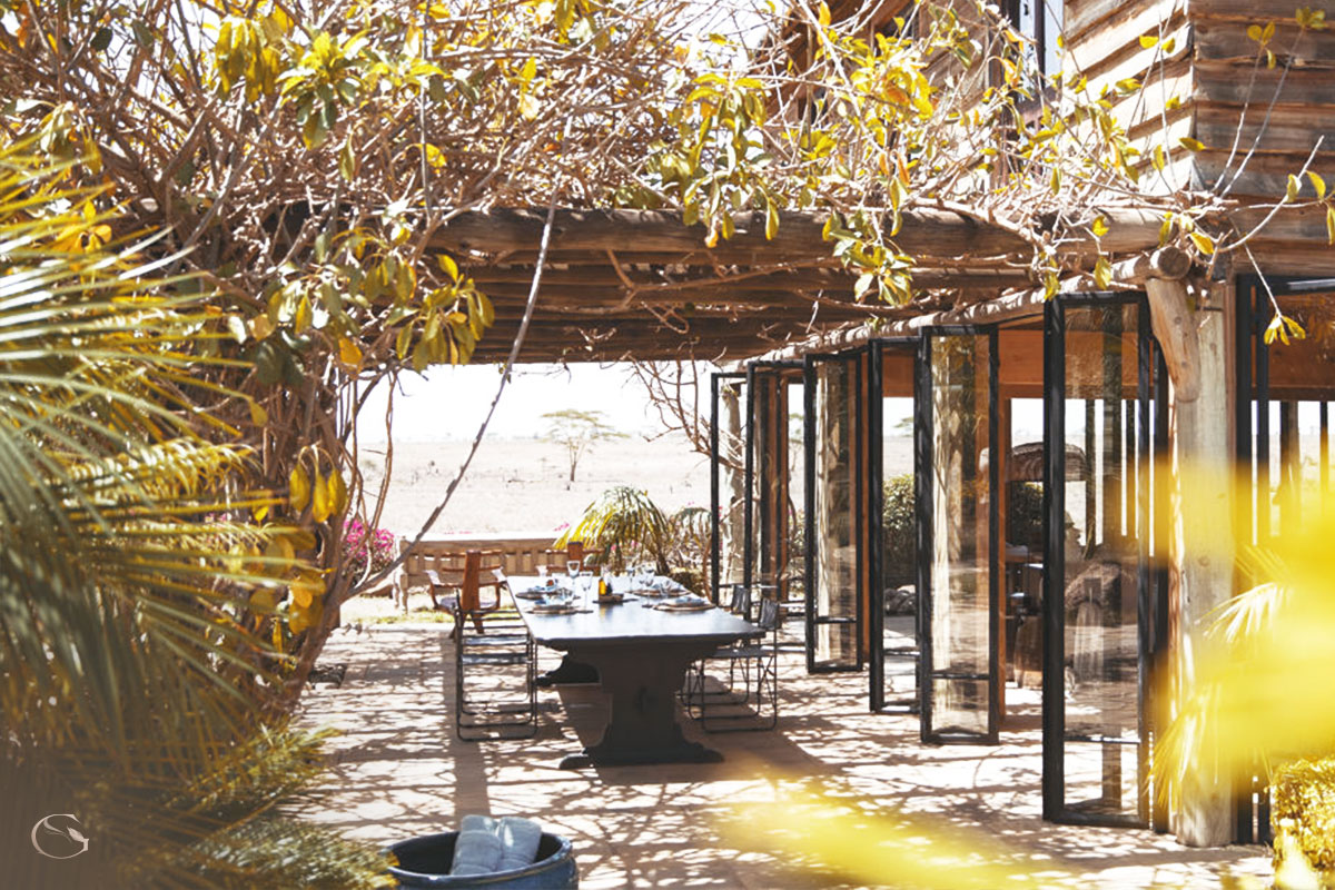 Outdoor dining at Villa Segera • LuxurySafariLodges.com