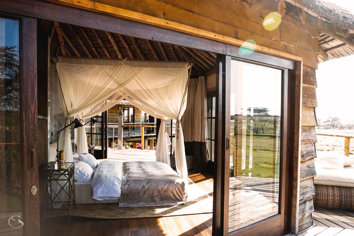 Elevated master bedroom at Villa Segera • LuxurySafariLodges.com